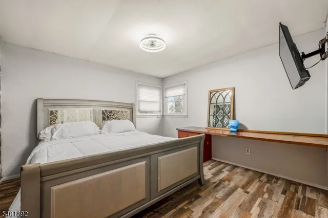 a room with a bed and a window