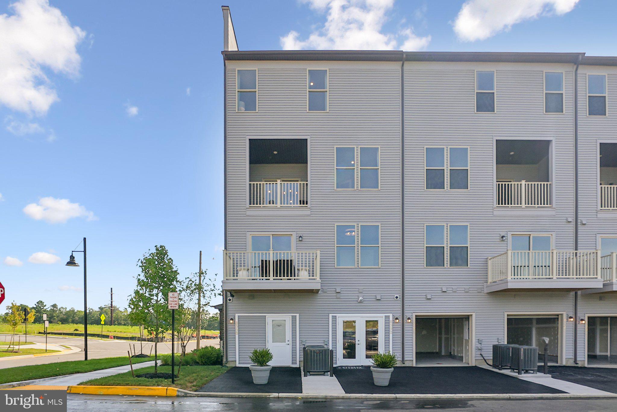 8630 Lovelace Street Manassas, VA 20110 - Photo 2 of 31 a view of building with yard