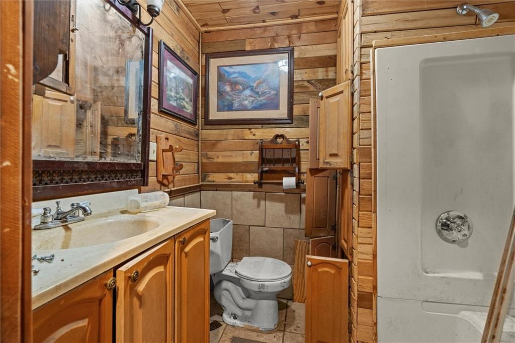 263 Buncombe-Waco Road Waco, GA 30182 - Photo 9 of 14 a bathroom with a sink toilet and shower