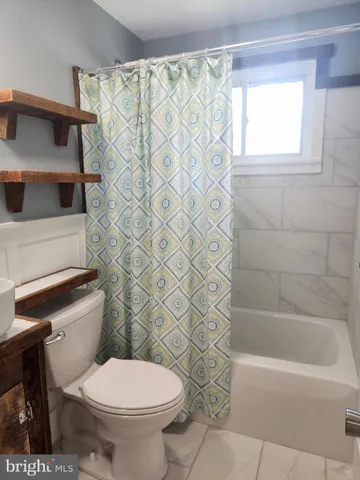 a view of an empty room with storage