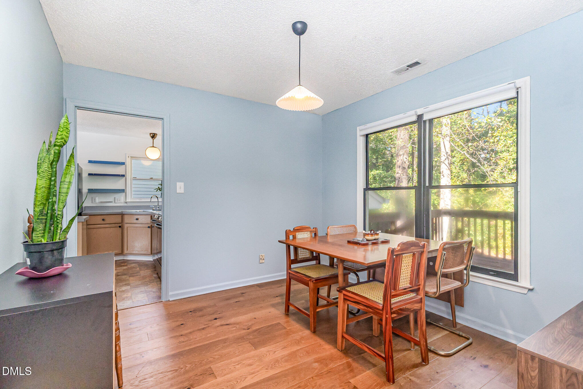 104 Forestchase Court Raleigh, NC 27603 - Photo 6 of 25 a dining room with furniture and window