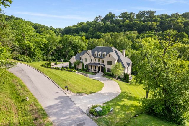 a view of a livingroom with furniture and window