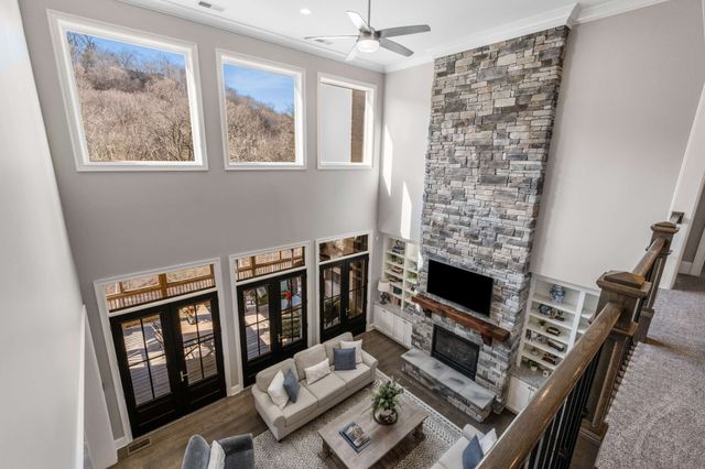 a room with furniture and a book shelf