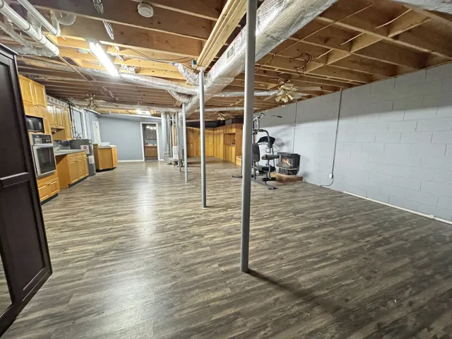 a view of a porch with wooden floor