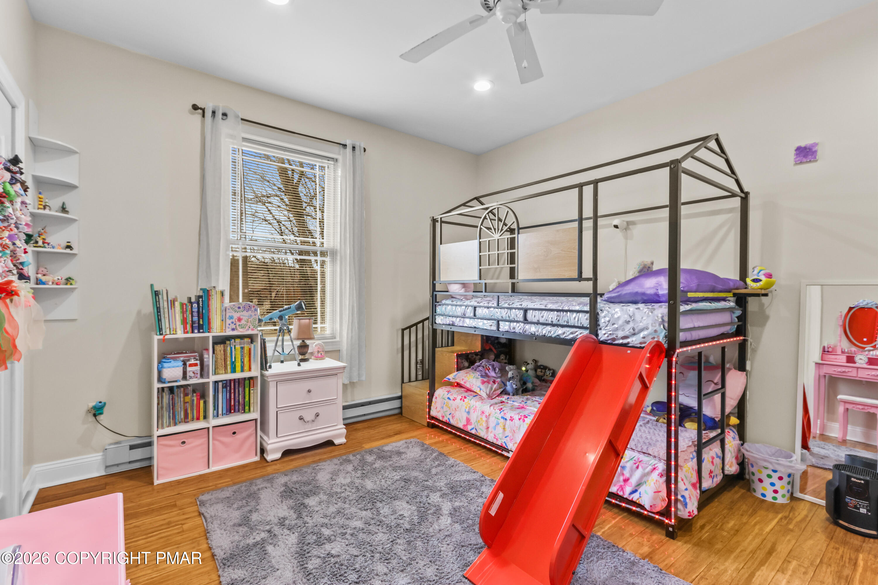 1007 Hampstead Road Bushkill, PA 18324 - Photo 19 of 68 a bedroom with a bed and a wooden floor