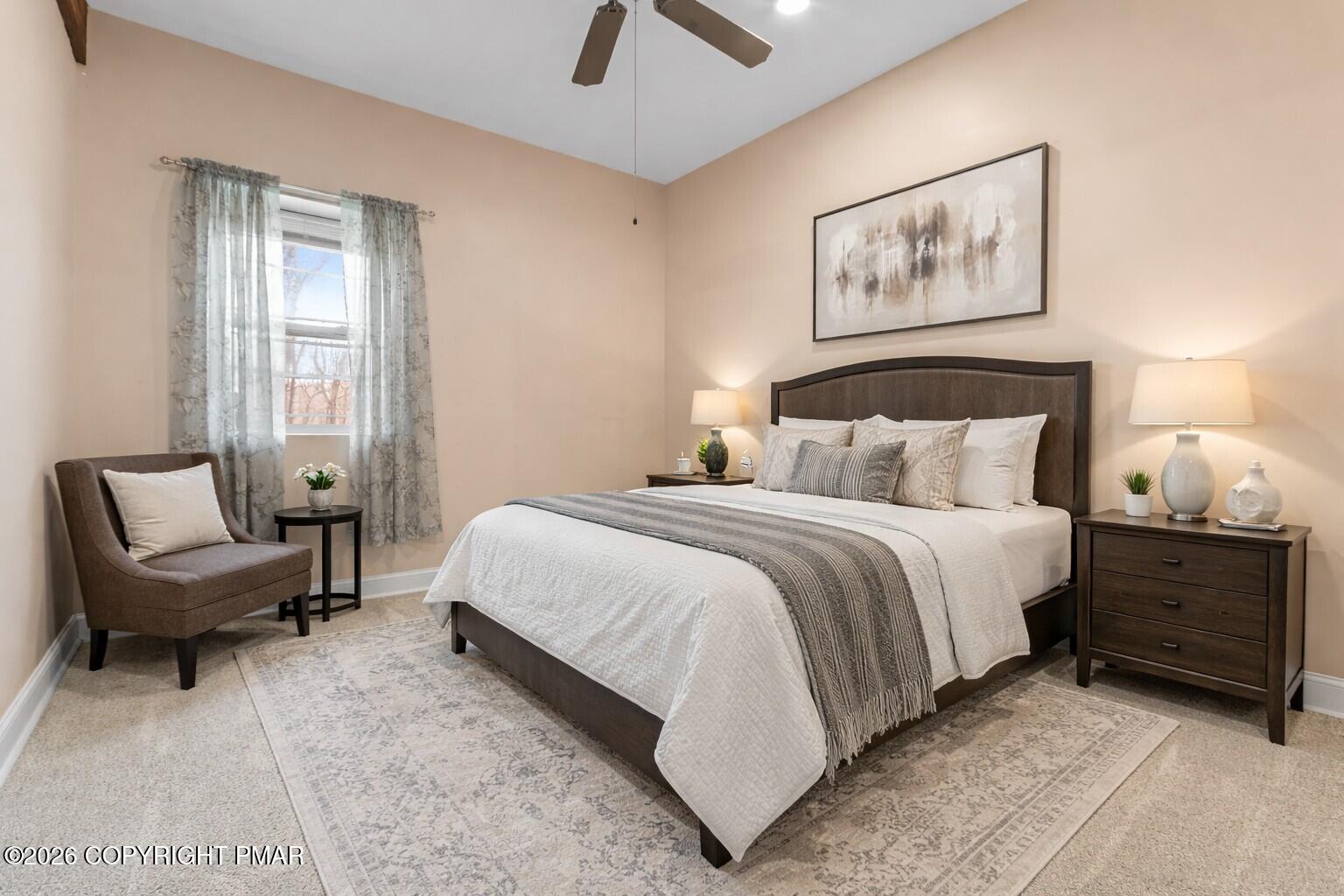 1007 Hampstead Road Bushkill, PA 18324 - Photo 34 of 68 a bedroom with a bed and a chair