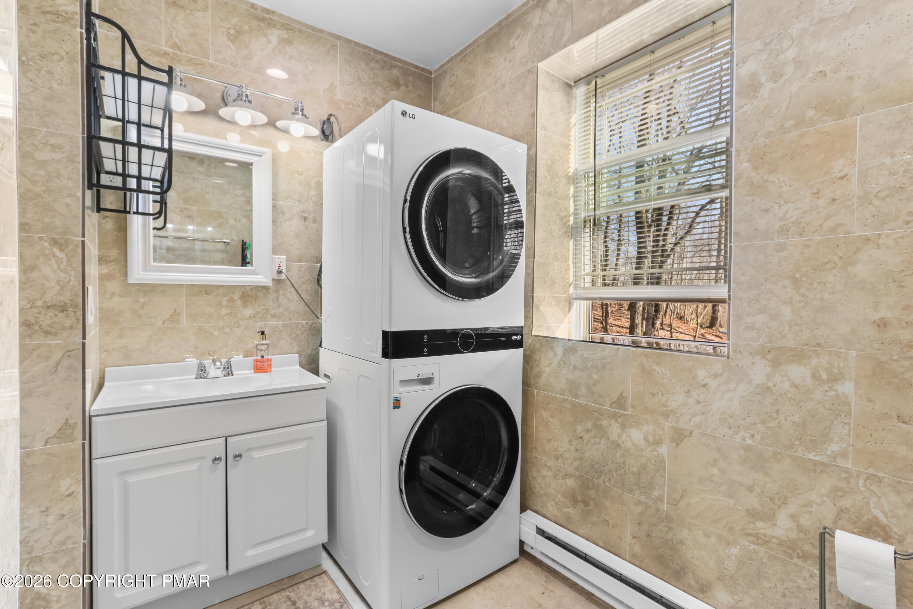 1007 Hampstead Road Bushkill, PA 18324 - Photo 36 of 68 a utility room with sink dryer and washer