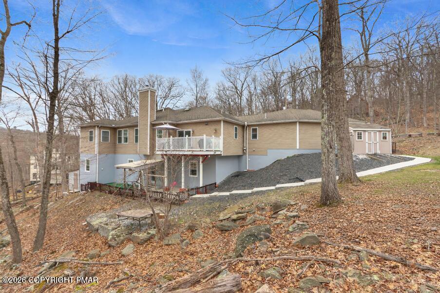 1007 Hampstead Road Bushkill, PA 18324 - Photo 46 of 68 a view of a large house with a yard