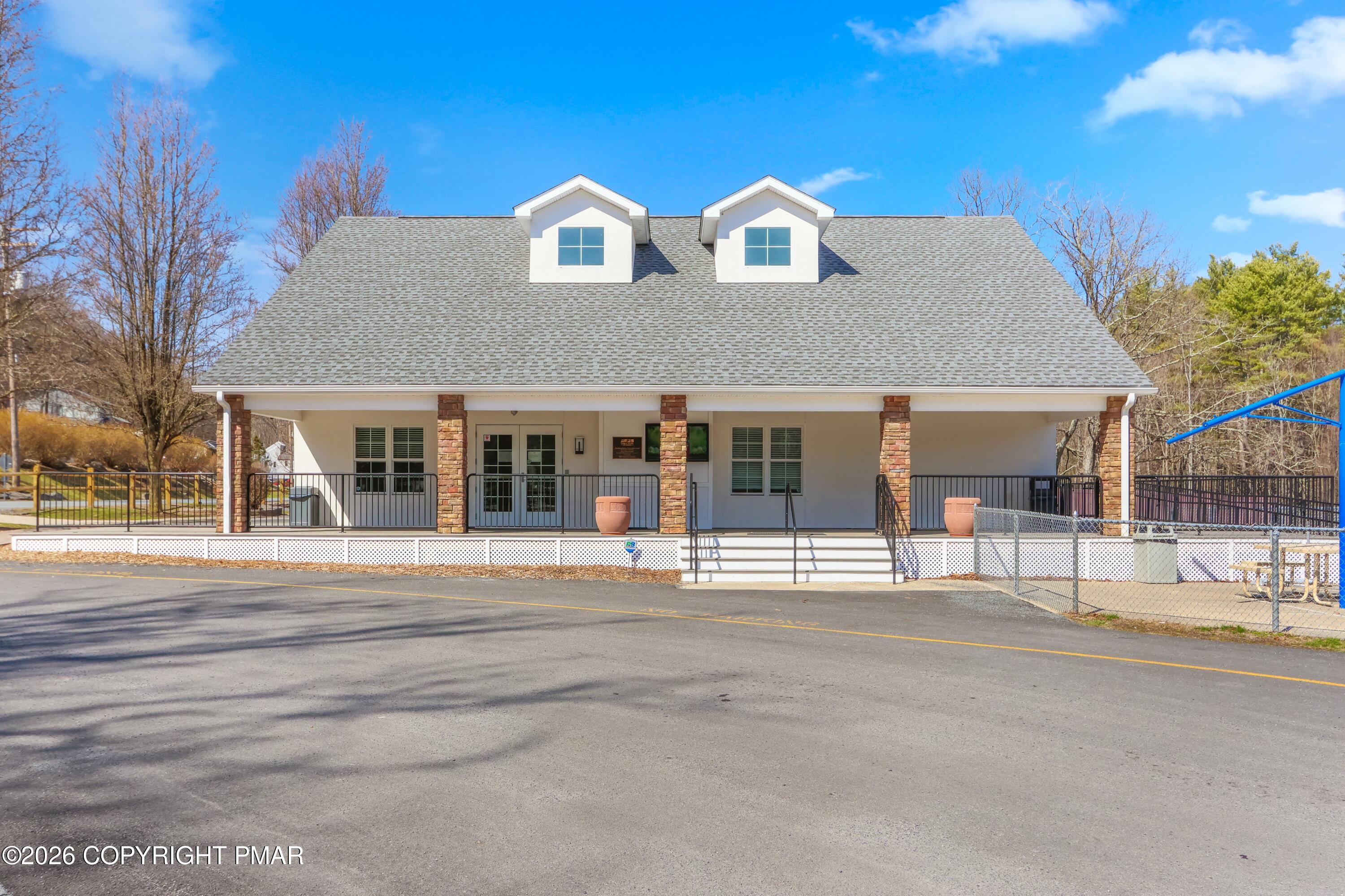 1007 Hampstead Road Bushkill, PA 18324 - Photo 58 of 68 a front view of a house with a garden