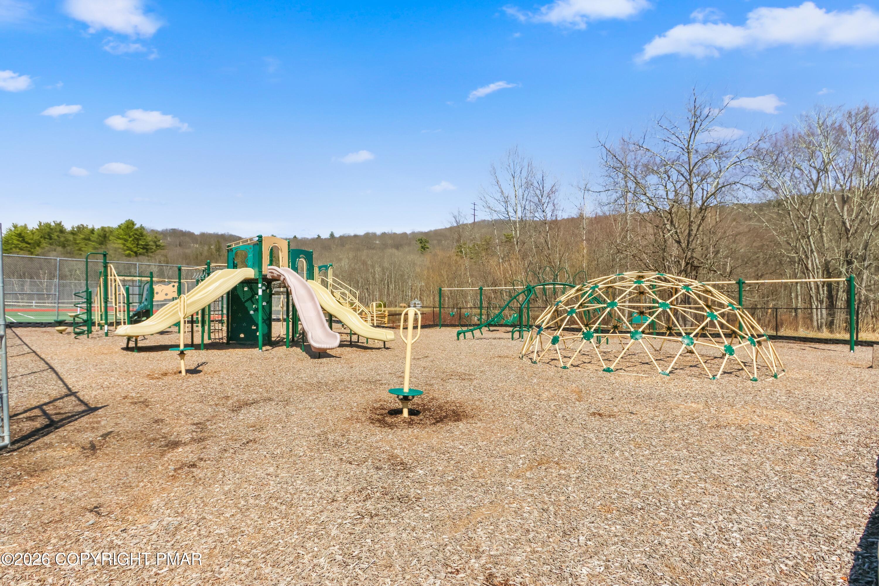 1007 Hampstead Road Bushkill, PA 18324 - Photo 63 of 68 a view of a park with a slide