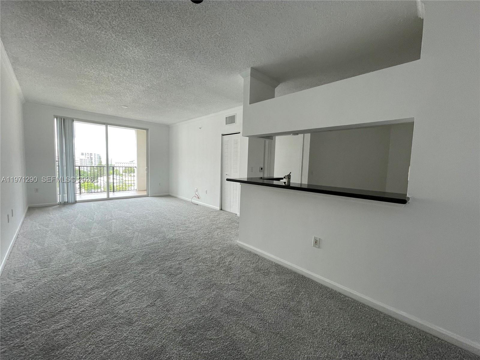 17150 North Bay Road, Unit 2911 Sunny Isles Beach, FL 33160 - Photo 2 of 43 a view of empty room with windows