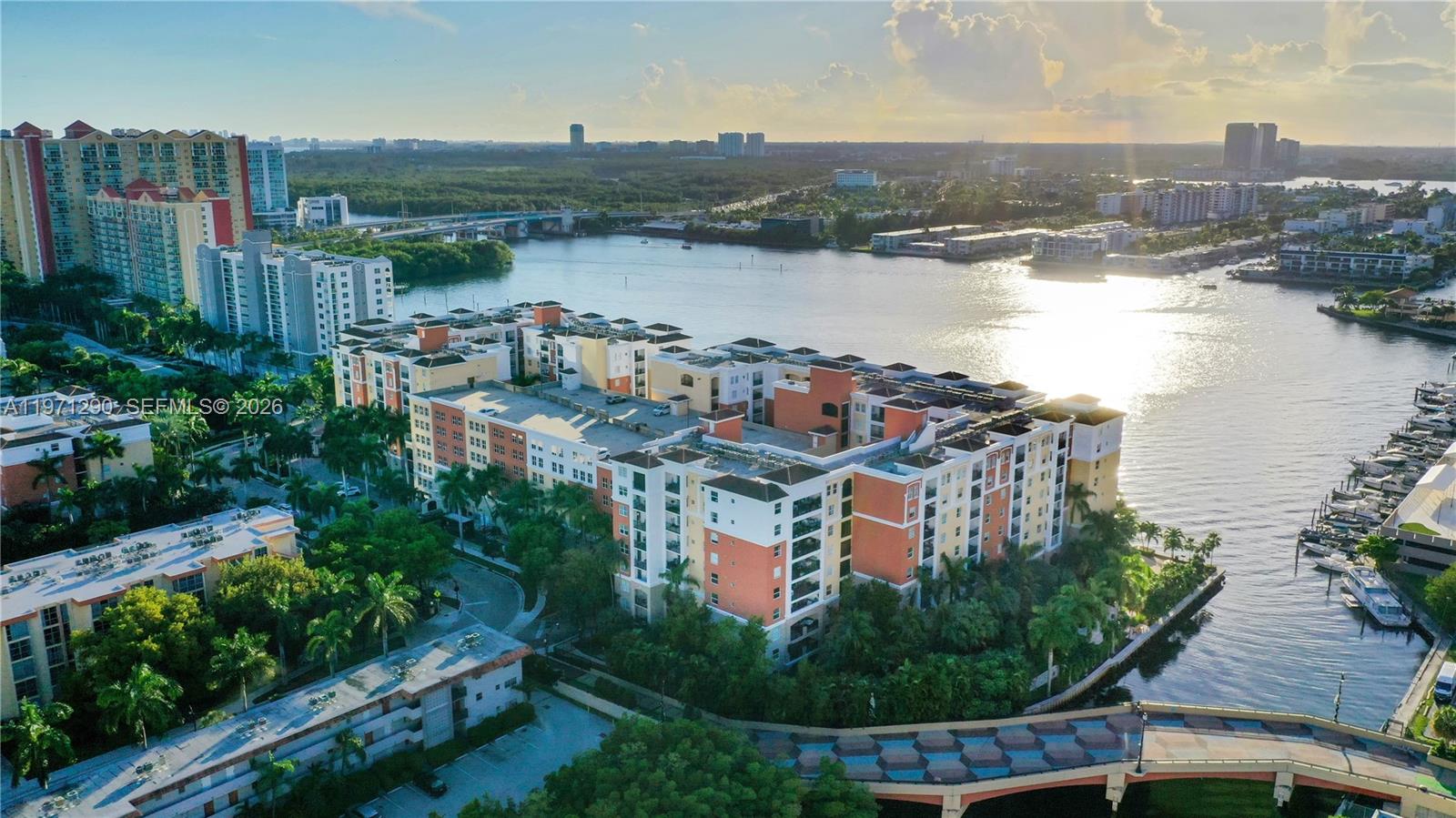 17150 North Bay Road, Unit 2911 Sunny Isles Beach, FL 33160 - Photo 22 of 43 a view of a lake with a mountain in the background