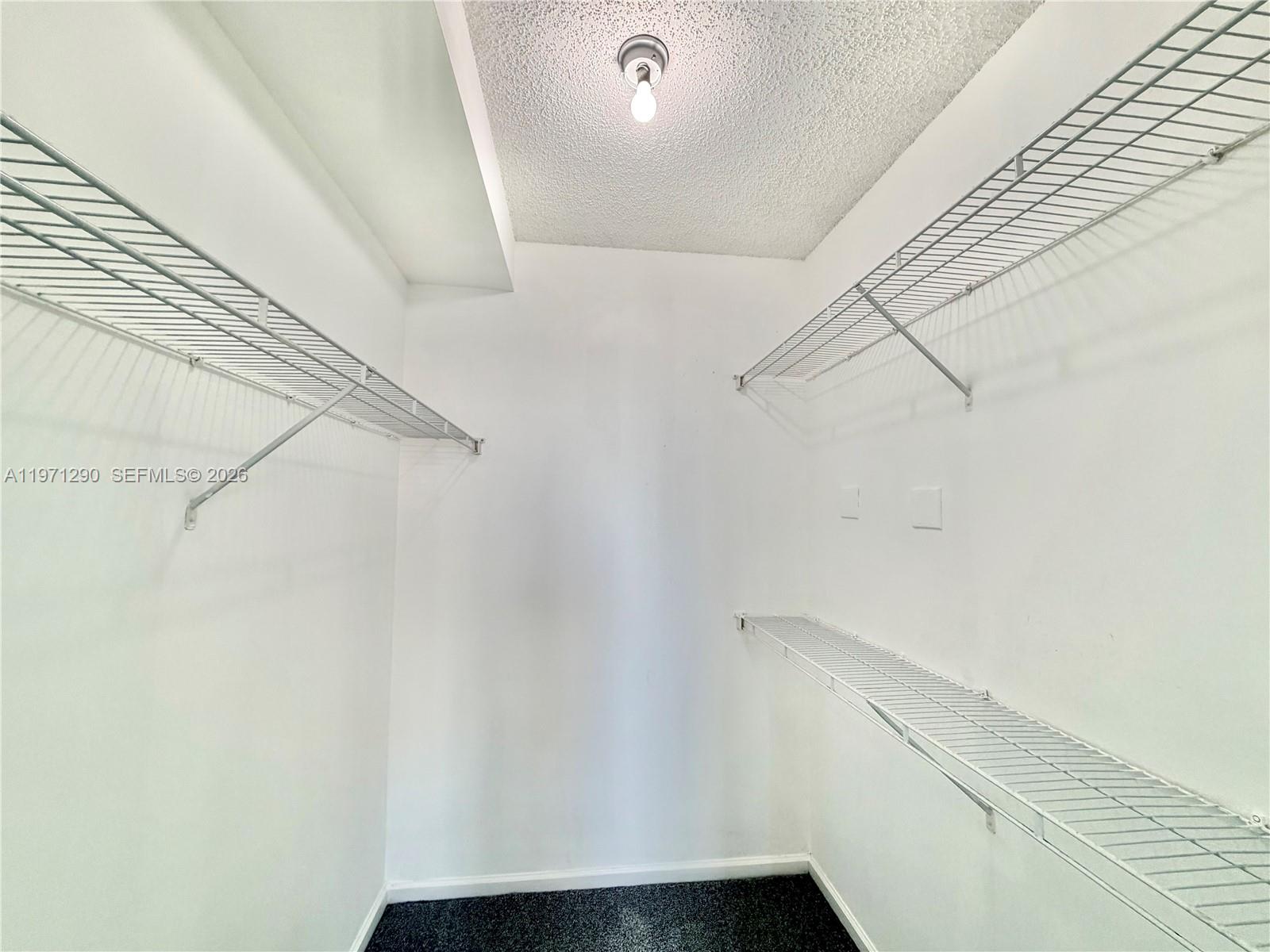 17150 North Bay Road, Unit 2911 Sunny Isles Beach, FL 33160 - Photo 33 of 43 a view of small space with racks on the wall