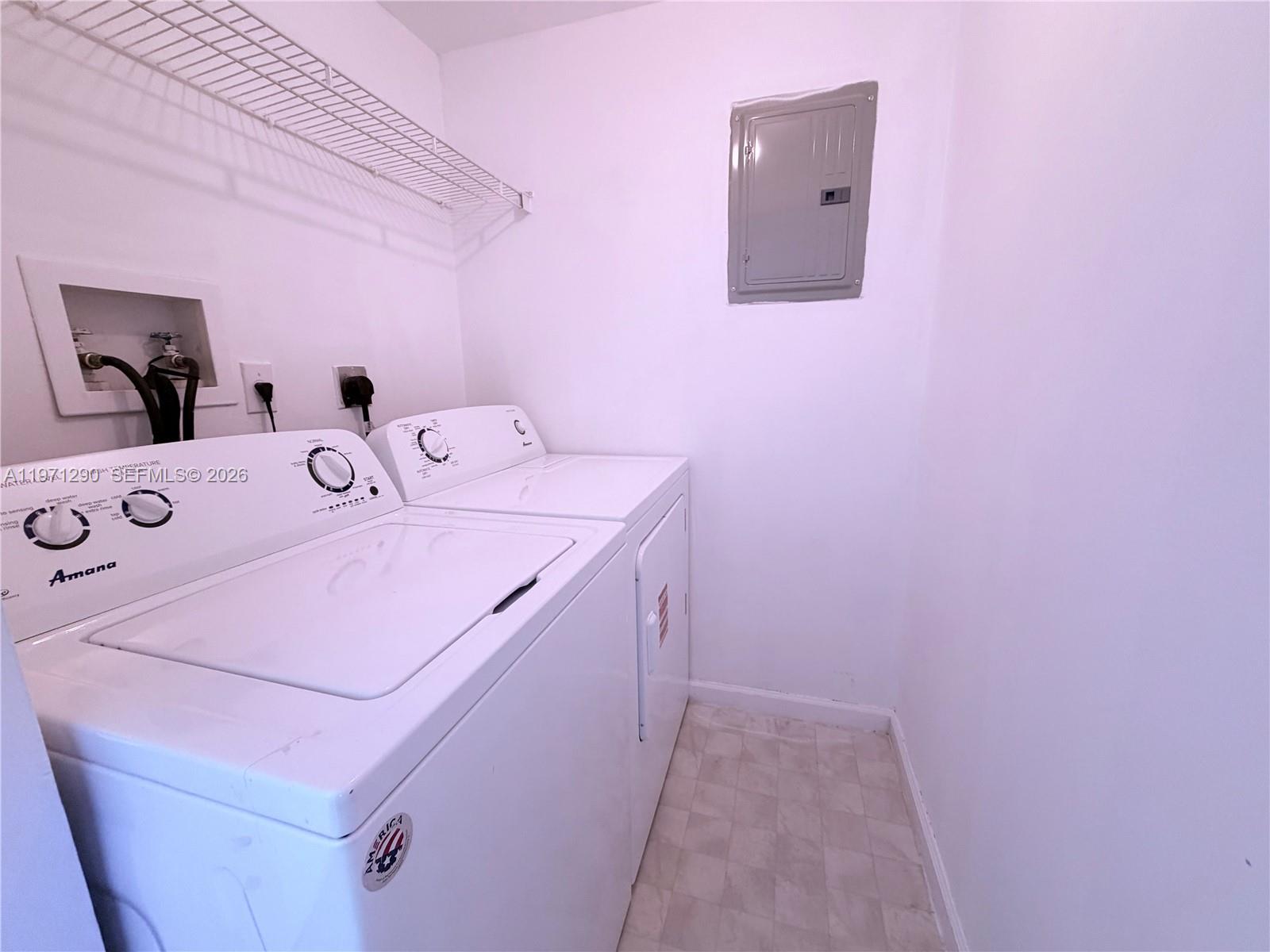 17150 North Bay Road, Unit 2911 Sunny Isles Beach, FL 33160 - Photo 43 of 43 a utility room with dryer and washer