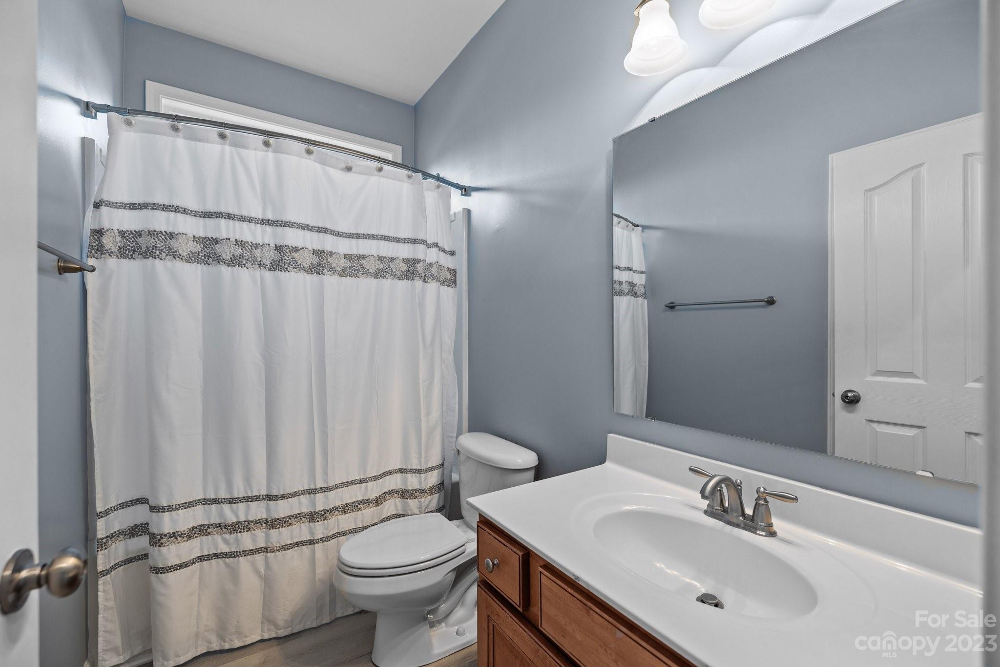 309 Ayers Road Fort Mill, SC 29715 - Photo 14 of 38 a bathroom with a sink toilet and shower