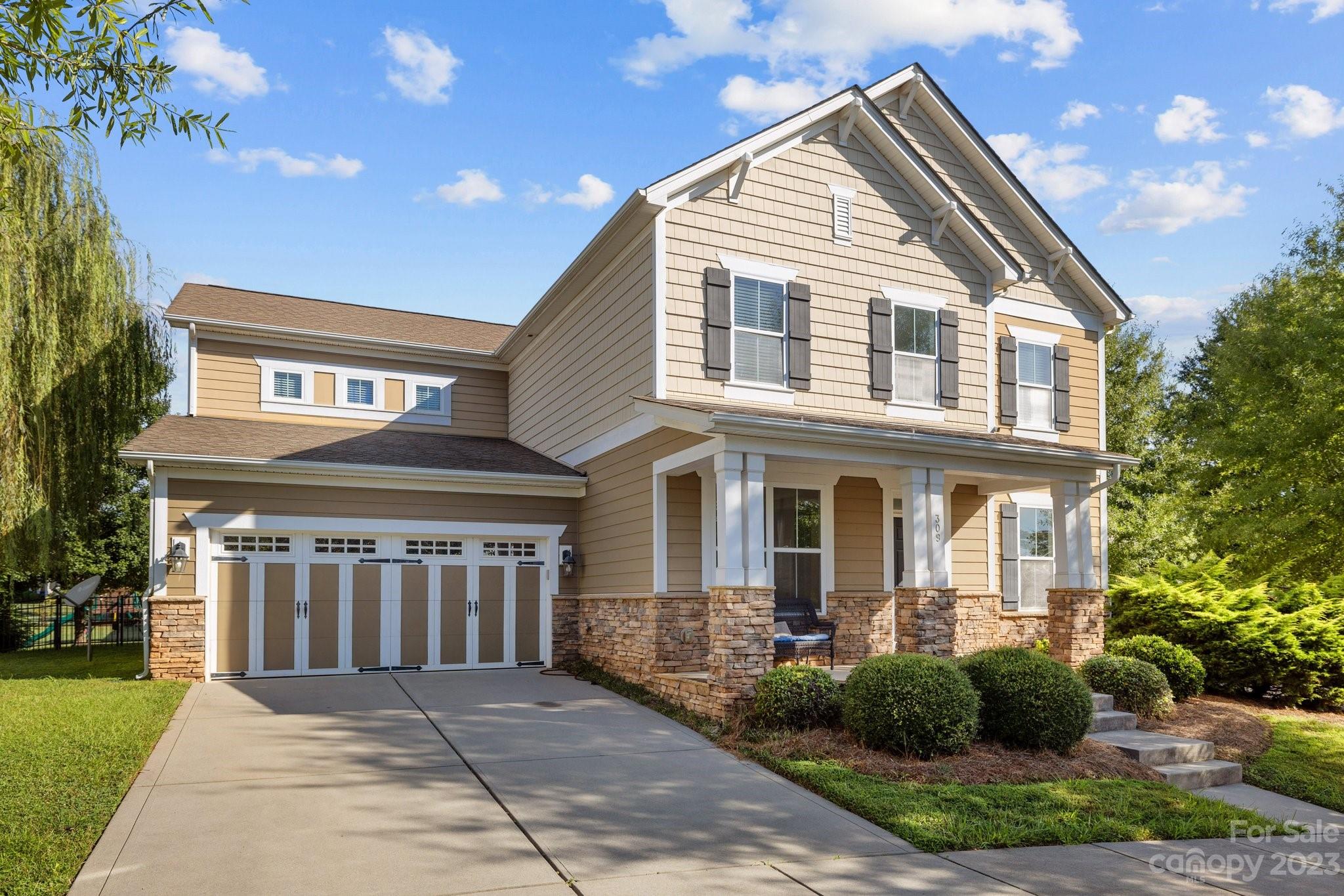309 Ayers Road Fort Mill, SC 29715 - Photo 2 of 38 a front view of a house with a yard