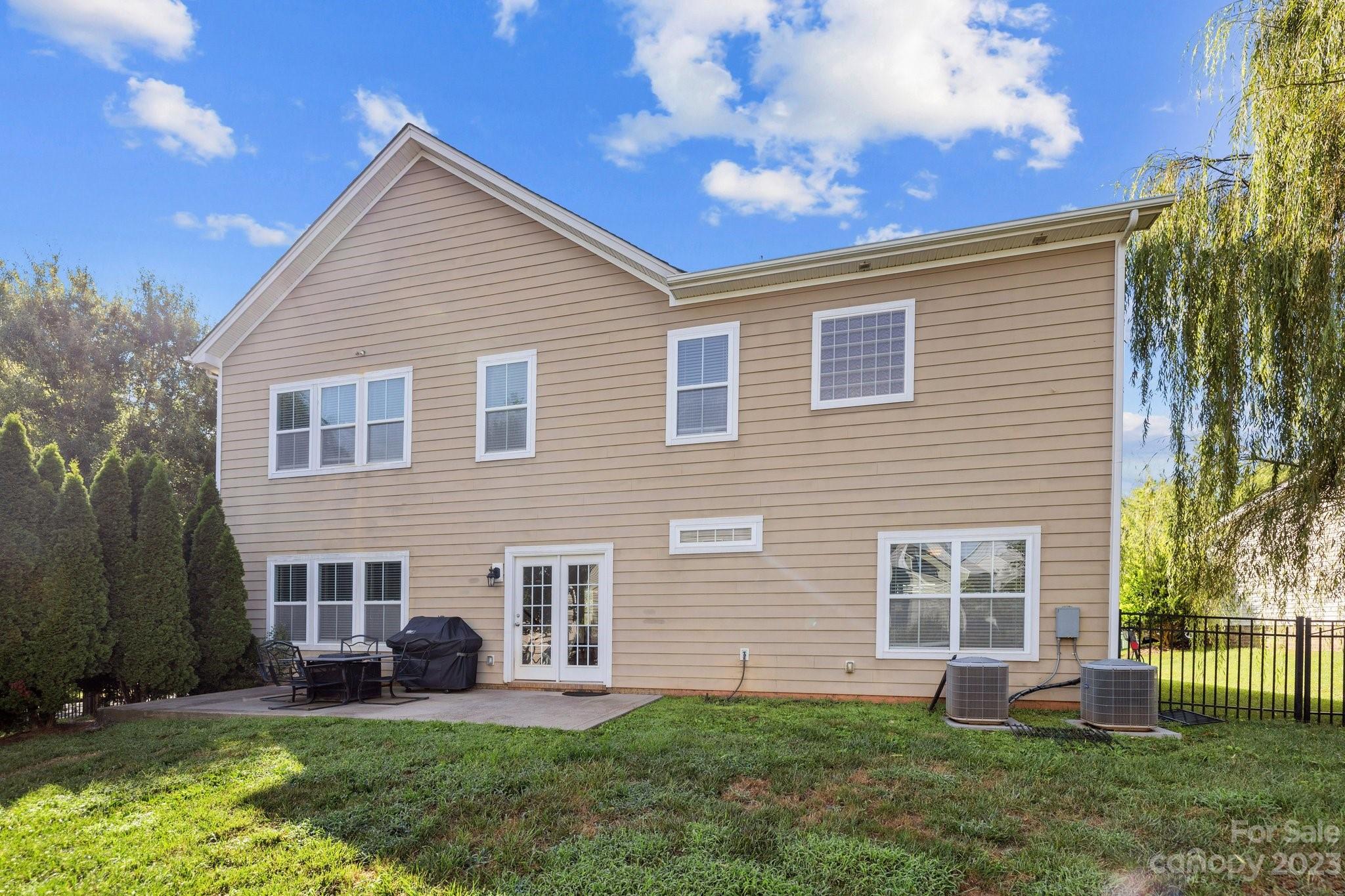 309 Ayers Road Fort Mill, SC 29715 - Photo 35 of 38 a front view of a house with a yard and garage