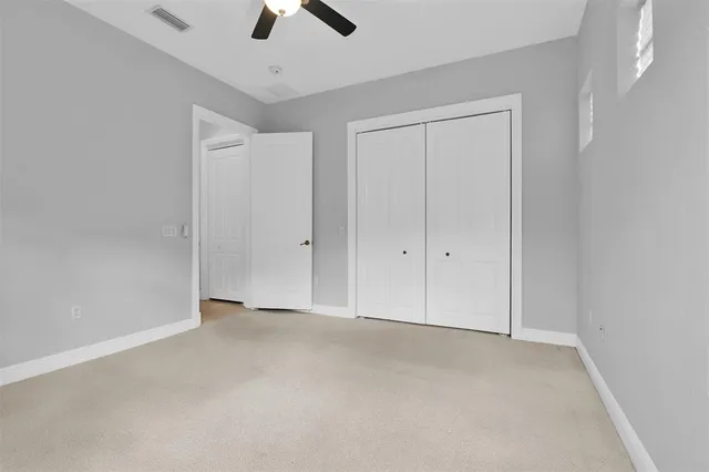 a view of empty room with windows