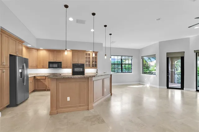a view of a brick house with a glass door
