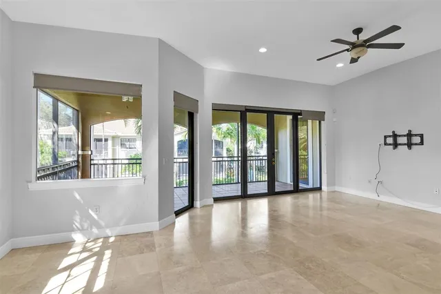 a bathroom with a granite countertop sink a mirror and a shower