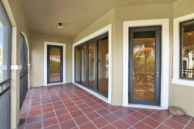a bathroom with a shower and a sink