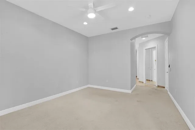 a view of a house with swimming pool and sitting area