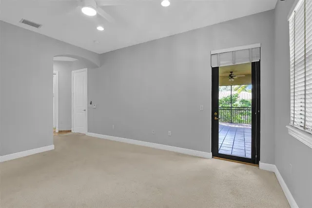 a view of a house with a yard and sitting area