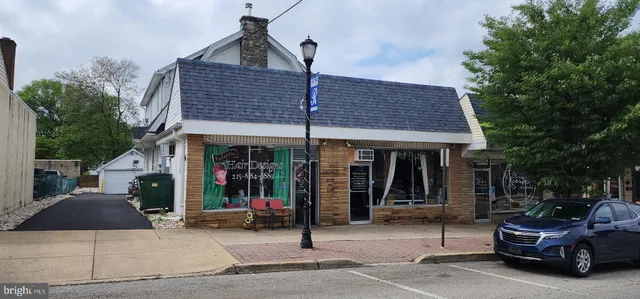 a car parked in front of a house