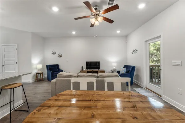 a room with furniture and a wooden floor