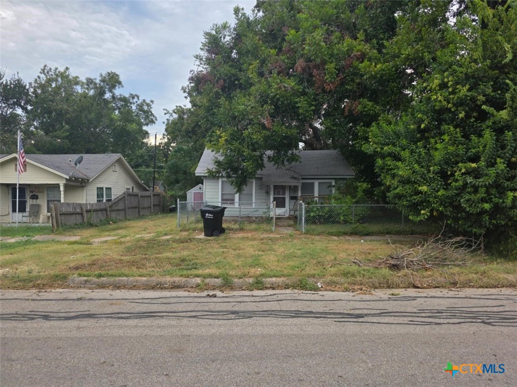 1214 South 19th Street Temple, TX 76504 - Photo 1 of 11 a view of a house with a swimming pool and sitting area