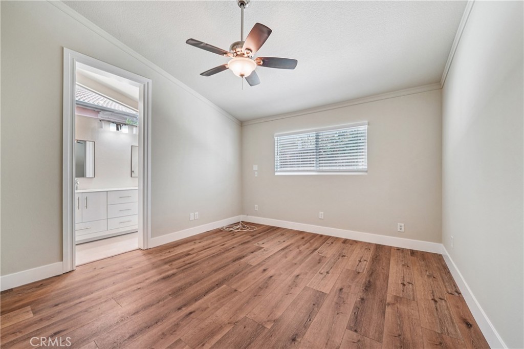 7271 Venosa Place Rancho Cucamonga, CA 91701 - Photo 14 of 32 wooden floor in an empty room with a window