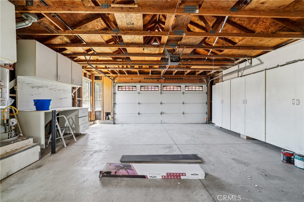 7271 Venosa Place Rancho Cucamonga, CA 91701 - Photo 25 of 32 a view of a garage with white walls