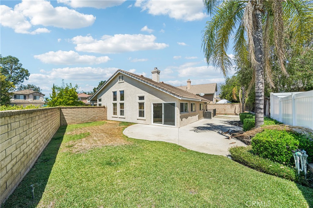 7271 Venosa Place Rancho Cucamonga, CA 91701 - Photo 26 of 32 a view of a house with a yard and furniture