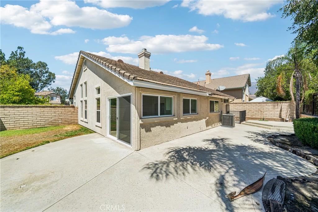 7271 Venosa Place Rancho Cucamonga, CA 91701 - Photo 29 of 32 a view of a house with backyard and garden