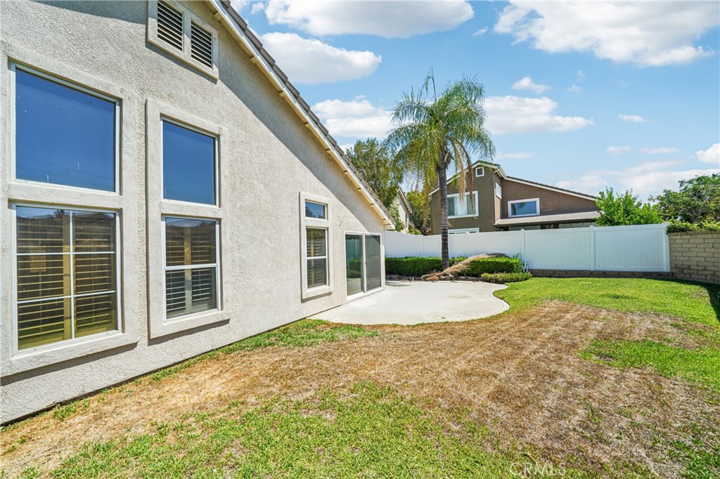 7271 Venosa Place Rancho Cucamonga, CA 91701 - Photo 30 of 32 a house that has a lot of windows in it