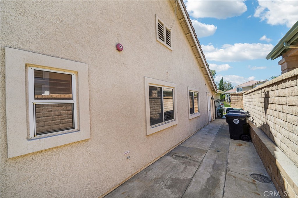 7271 Venosa Place Rancho Cucamonga, CA 91701 - Photo 32 of 32 a view of a house with many windows