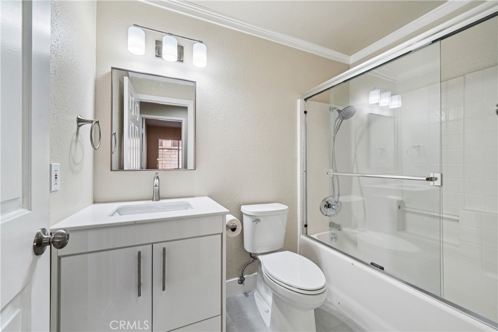 7271 Venosa Place Rancho Cucamonga, CA 91701 - Photo 10 of 32 a bathroom with a sink toilet and shower