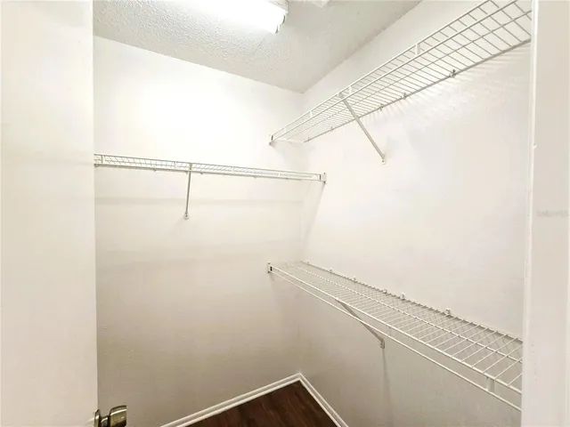 a view of a room with racks on the wall