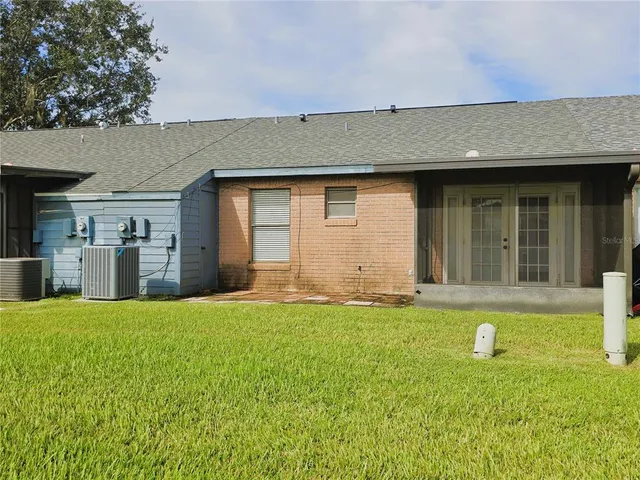 a house view with a garden space