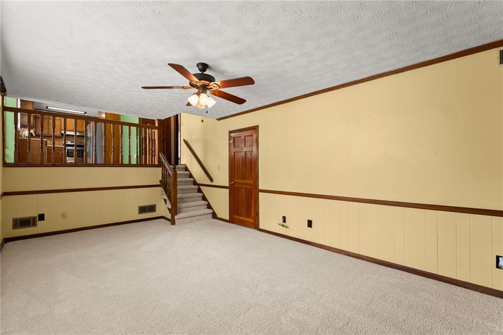 4691 Lucerne Valley Road Southwest Lilburn, GA 30047 - Photo 19 of 55 a view of an empty room with a window