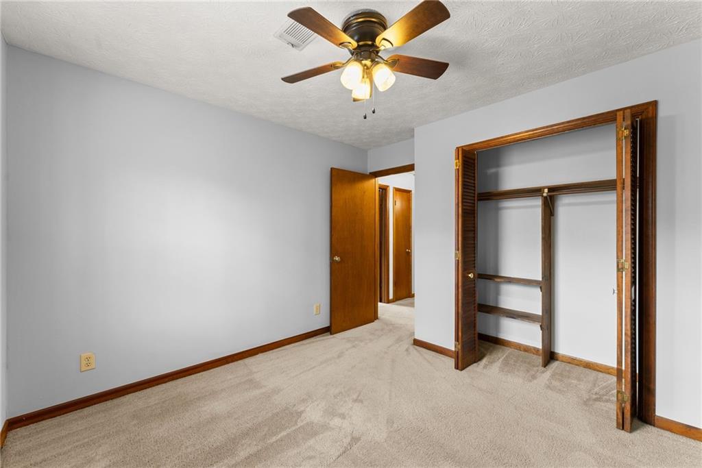 4691 Lucerne Valley Road Southwest Lilburn, GA 30047 - Photo 31 of 55 wooden floor in an empty room with a window