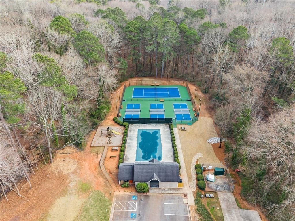 4691 Lucerne Valley Road Southwest Lilburn, GA 30047 - Photo 55 of 55 an aerial view of a house with a yard