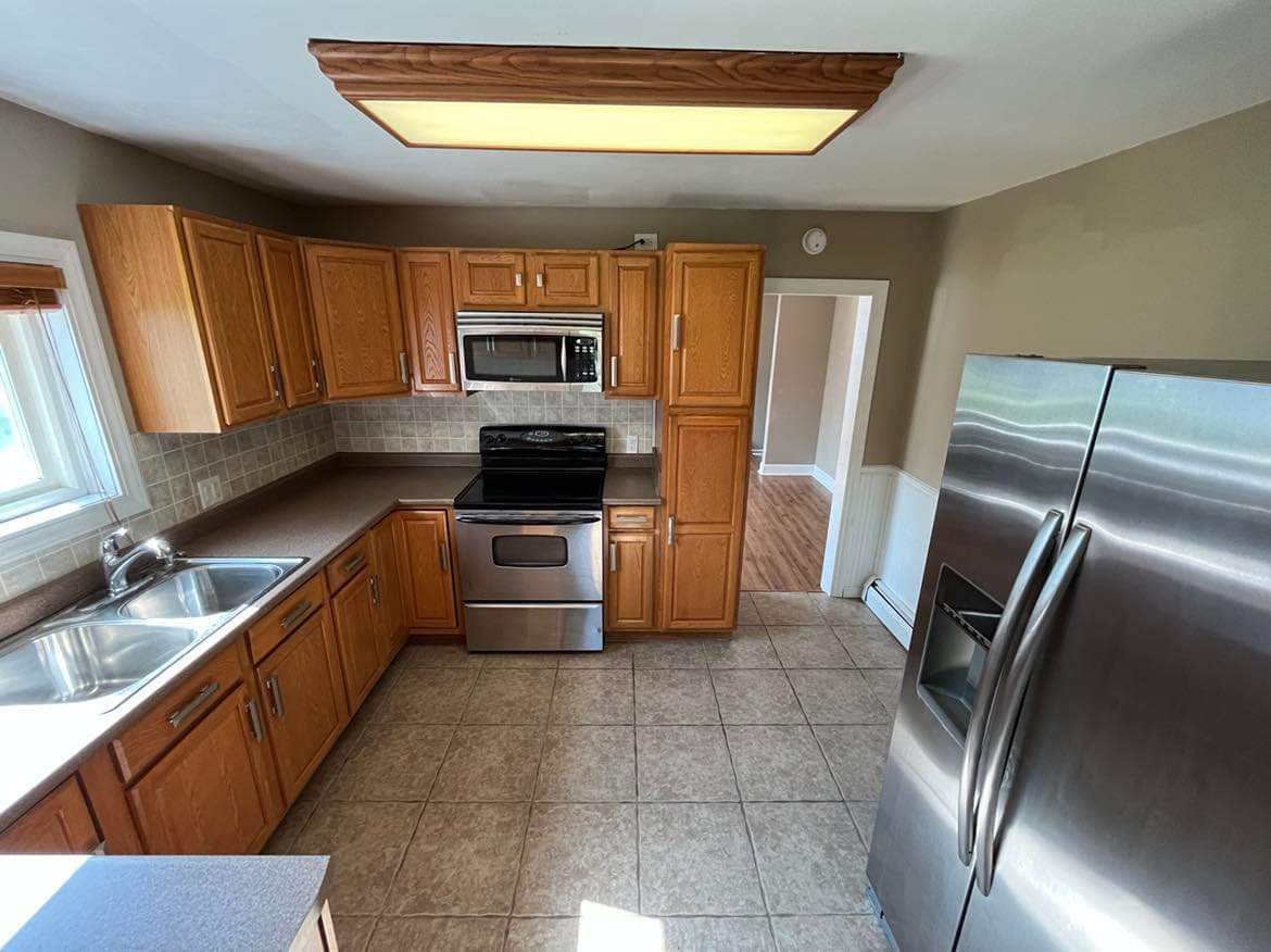 145 West Southmor Road Morris, IL 60450 - Photo 12 of 16 a kitchen with a refrigerator sink and stove