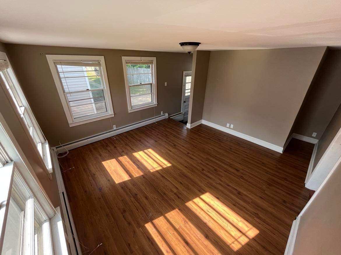145 West Southmor Road Morris, IL 60450 - Photo 3 of 16 a view of an empty room with wooden floor and a window