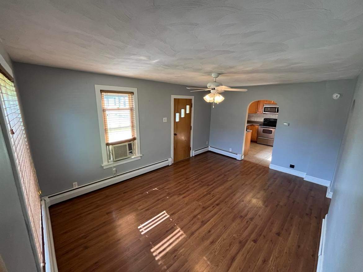 145 West Southmor Road Morris, IL 60450 - Photo 4 of 16 wooden floor in an empty room with a window