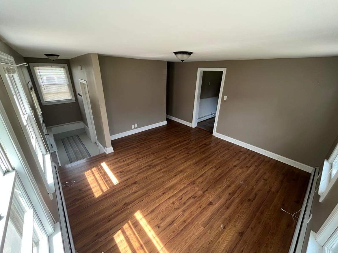 145 West Southmor Road Morris, IL 60450 - Photo 5 of 16 a view of an empty room with wooden floor and a window