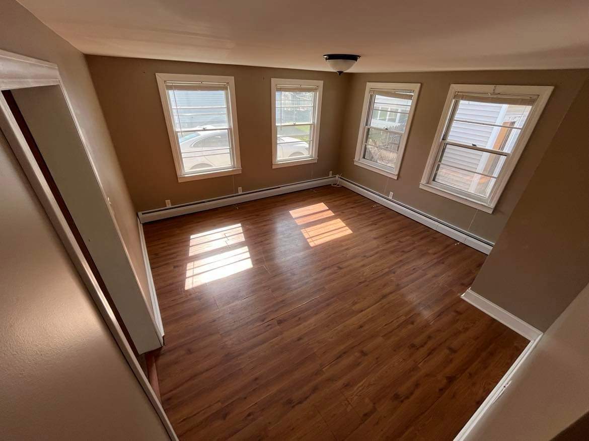 145 West Southmor Road Morris, IL 60450 - Photo 6 of 16 wooden floor in an empty room with windows