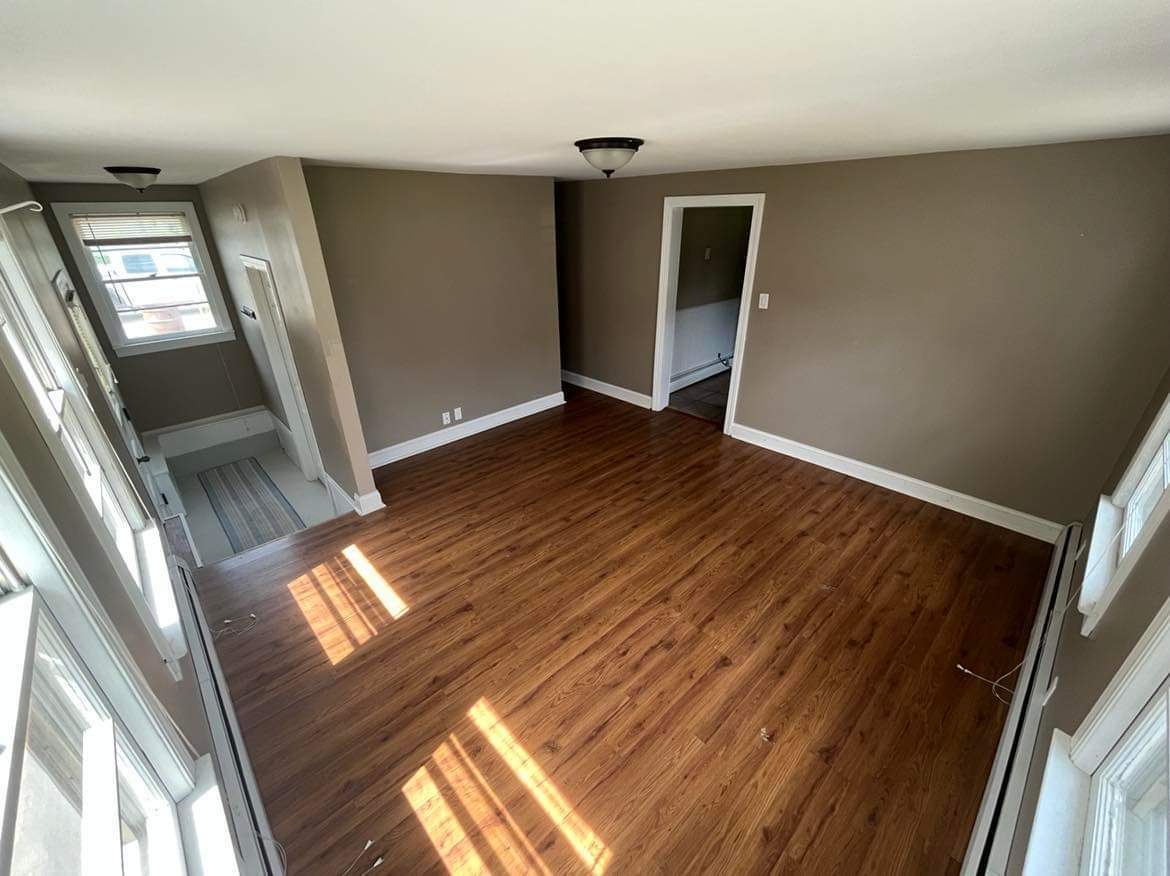 145 West Southmor Road Morris, IL 60450 - Photo 8 of 16 en empty room with wooden floor and windows
