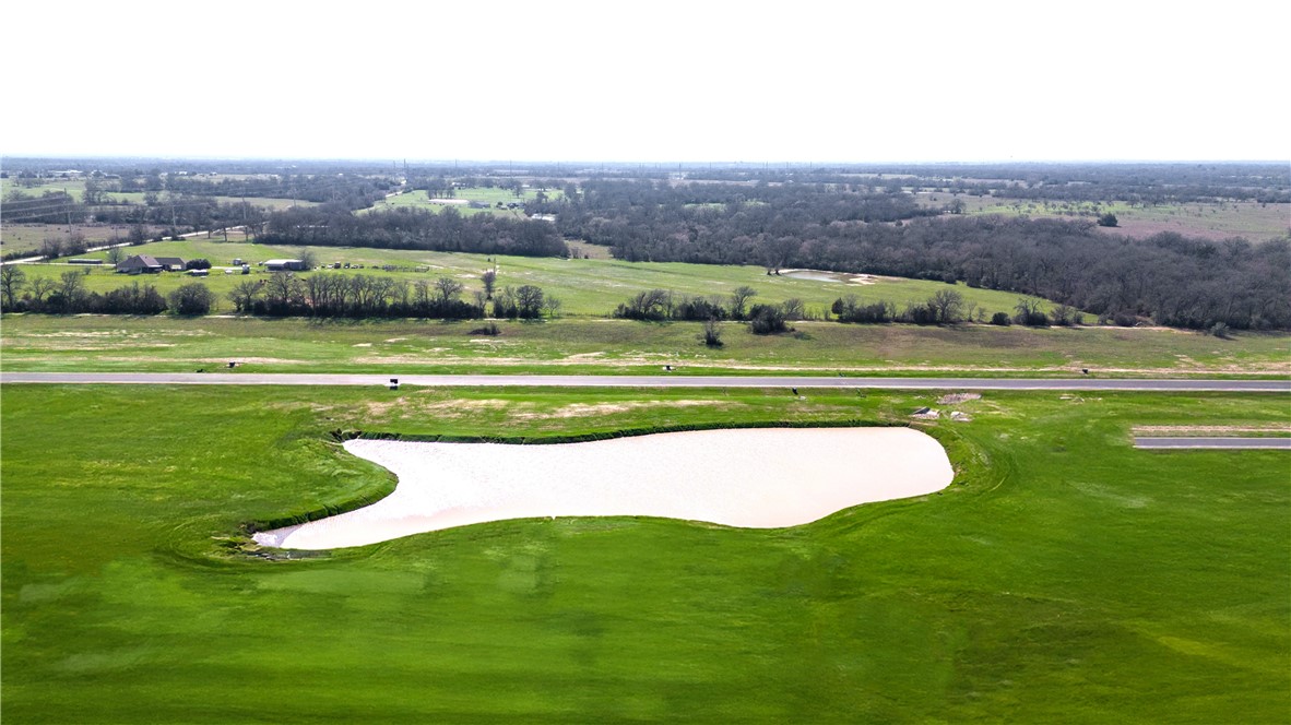 Tbd Tbd Plata Way Bryan, TX 77808 - Photo 11 of 18 a view of a grassy area with an ocean