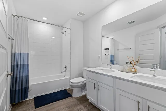 a bedroom with furniture and window